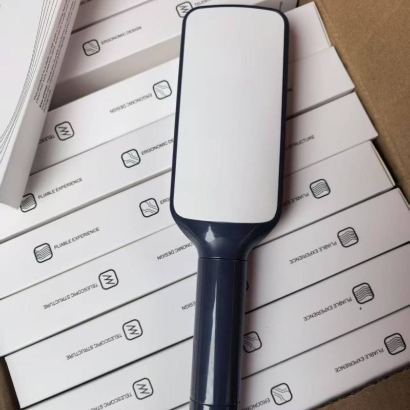 Self-Cleaning Detangler BrushTM