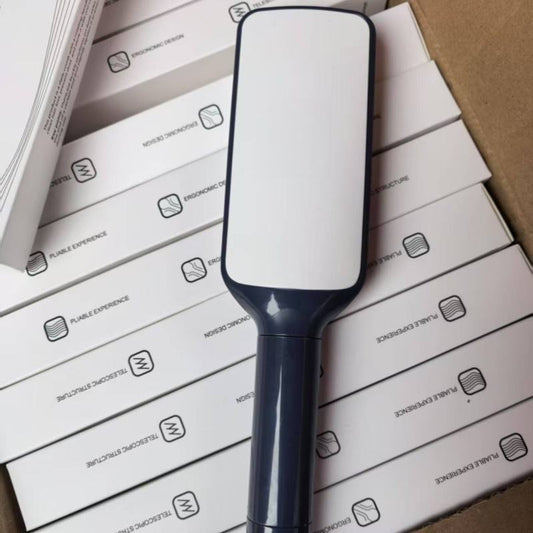 Self-Cleaning Detangler BrushTM