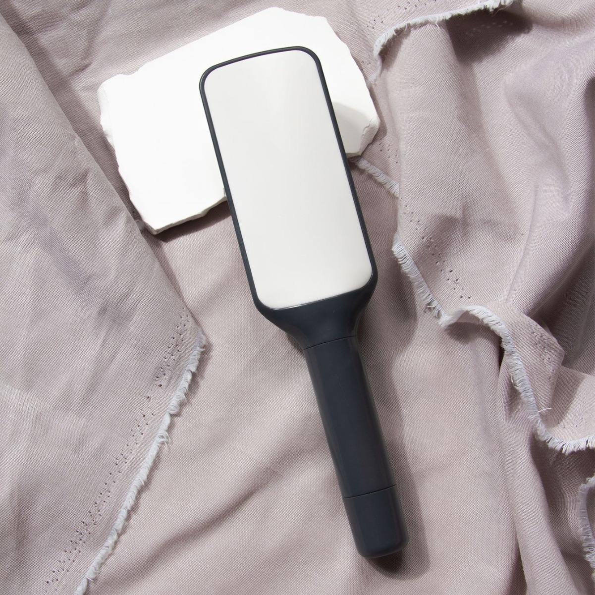 Self-Cleaning Detangler BrushTM