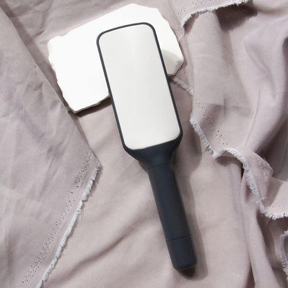 Self-Cleaning Detangler BrushTM